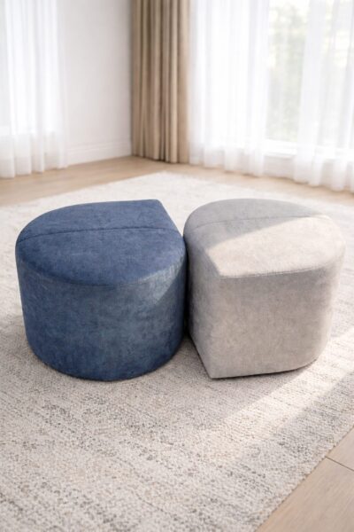 GOCCIA designer pouf ottomans used as flexible seating in a modern living space