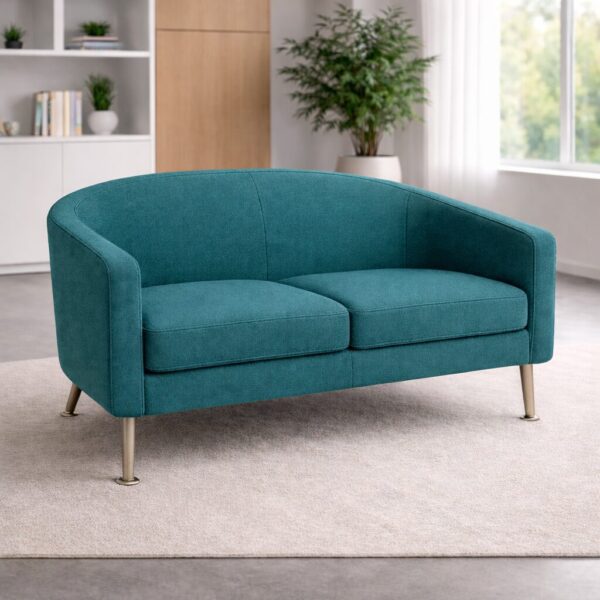 Contemporary ZOOT two seater sofa in teal fabric featuring a curved silhouette and metal legs.