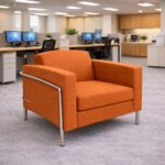 Venus single seater reception armchair upholstered in orange fabric for modern office waiting areas.