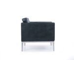 Side profile of Monza single seater office lounge chair with stainless steel frame.