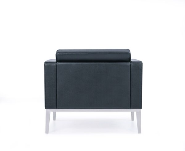 Rear view of Monza lounge chair showcasing clean upholstered back panel.